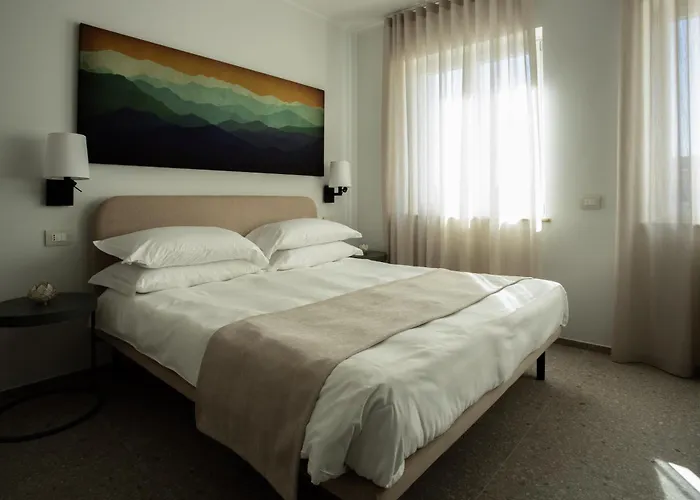 アパートホテル Palazzo Indaco カステル・ディ・サングロ